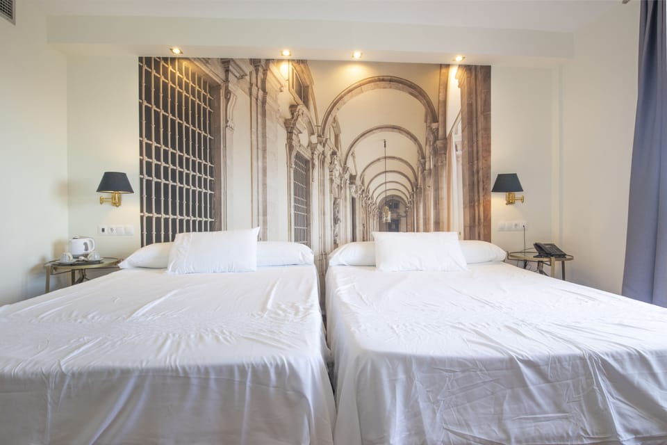 Quadruple Room | Desk, iron/ironing board, free WiFi, bed sheets