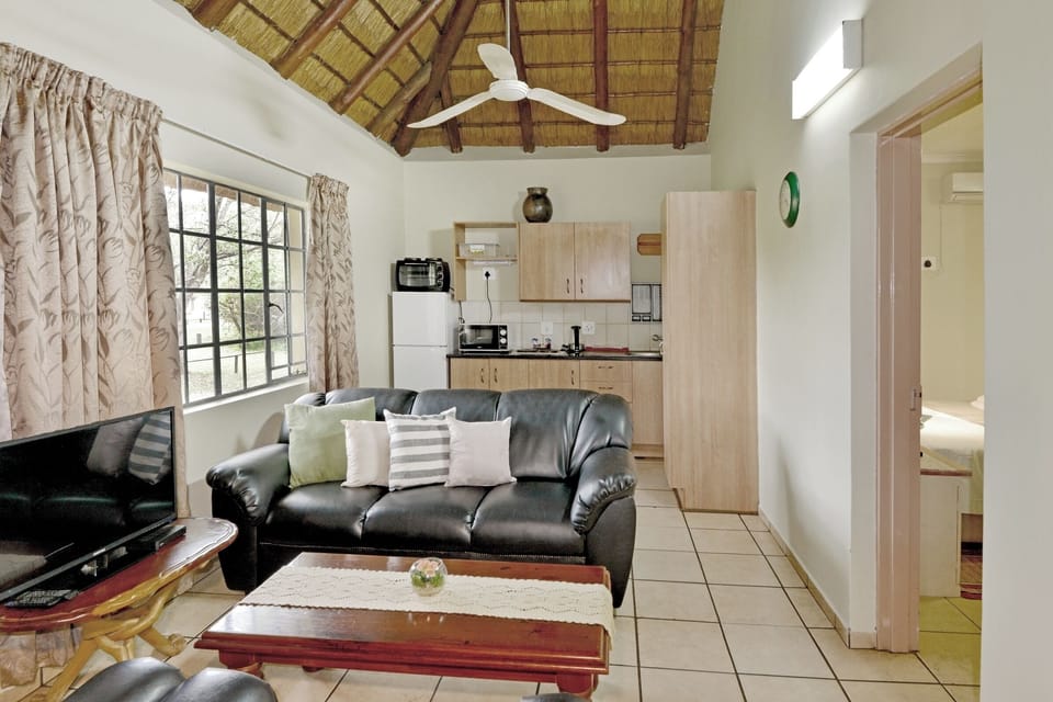 Jackalberry Cottage | Private kitchen | Fridge, microwave, oven, stovetop