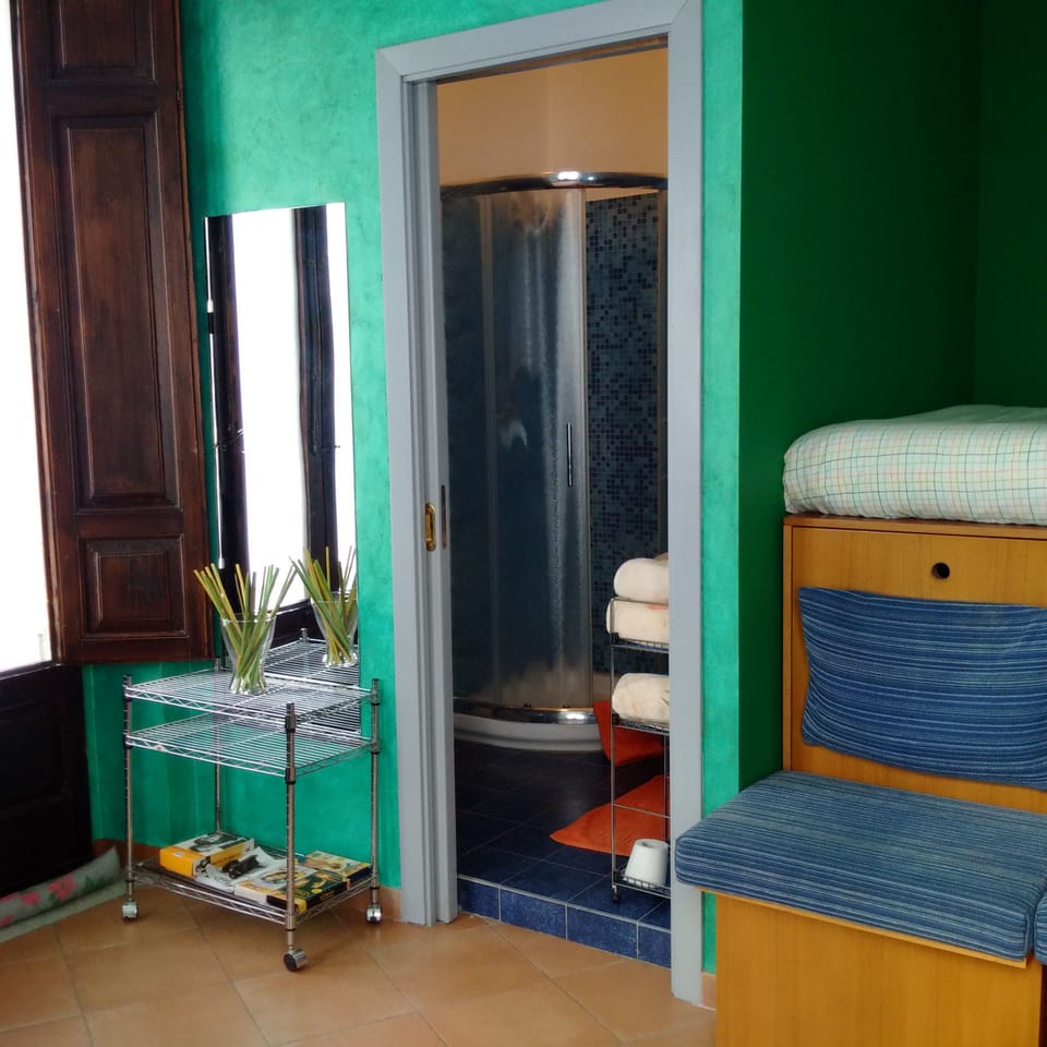 Basic Triple Room, Balcony, City View | Bathroom | Shower, free toiletries, hair dryer, bidet