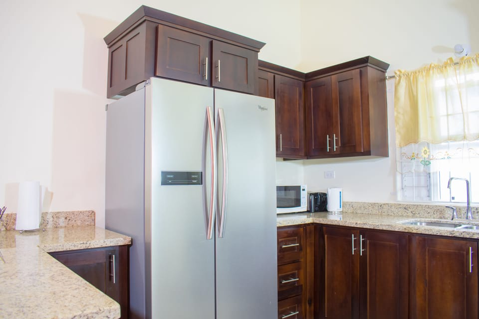 Family Villa, 3 Bedrooms, Ensuite, Courtyard View | Private kitchen | Coffee/tea maker, full-size fridge, microwave, oven