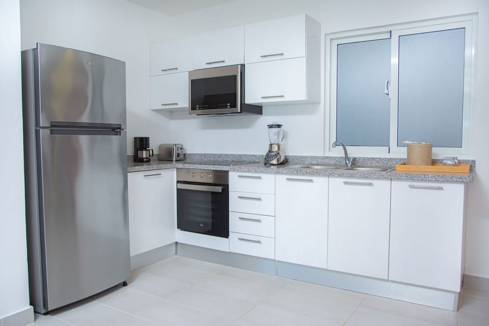 Apartment, 2 Bedrooms, Pool View | Private kitchenette | Coffee/tea maker, mini-fridge