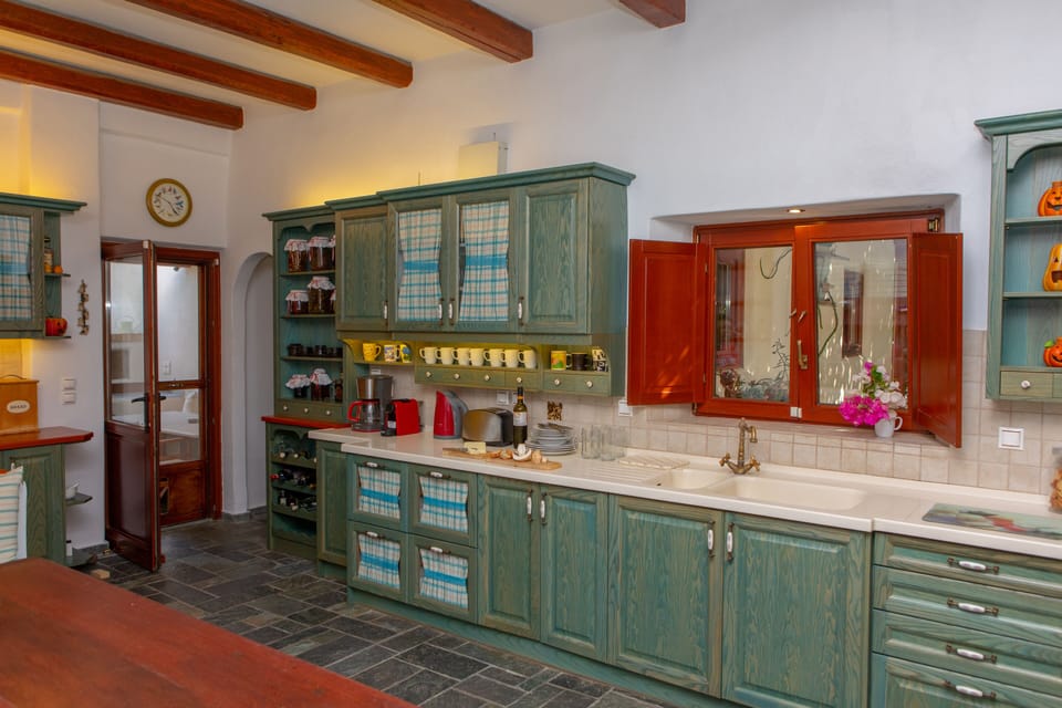 Luxury Villa | Private kitchen | Full-size fridge, microwave, oven, stovetop