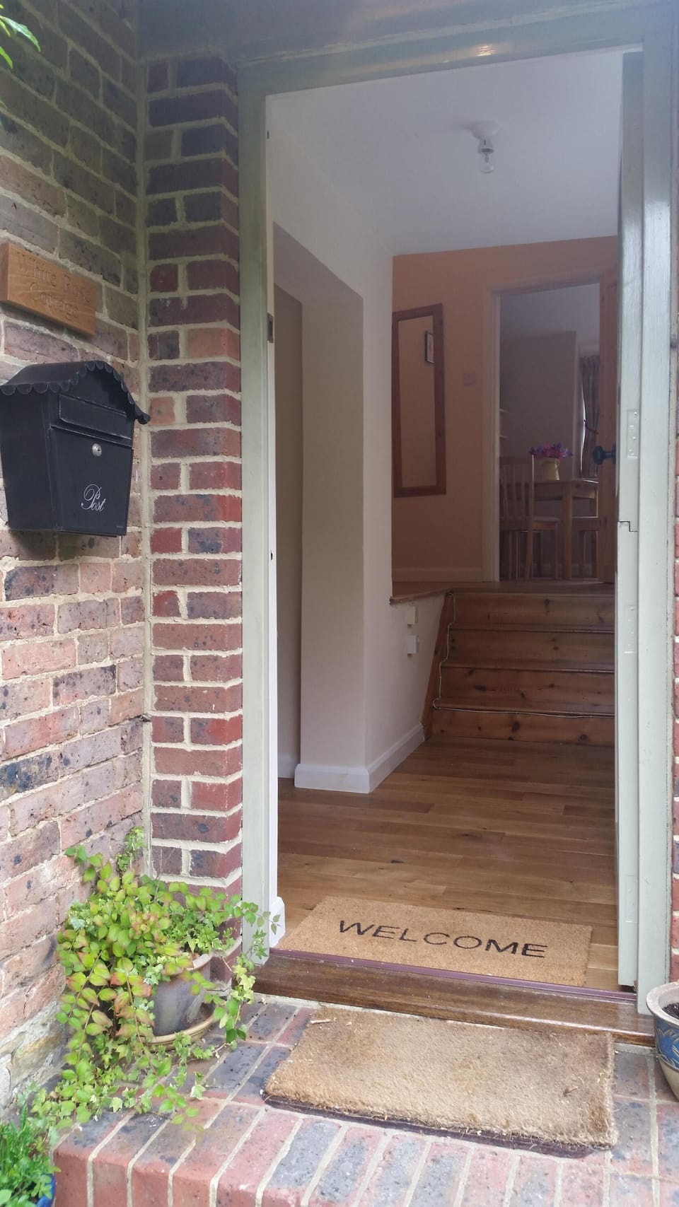 A warm 'Welcome' awaits you at White Rose Cottage - view through the front door