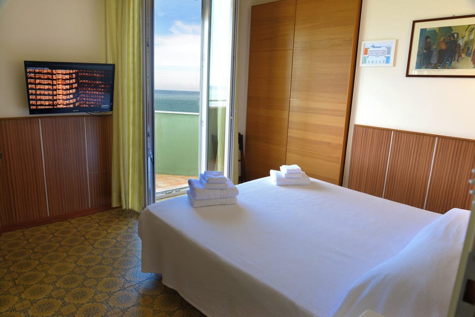 Double or Twin Room, Balcony, Sea View | In-room safe, desk, free WiFi, bed sheets