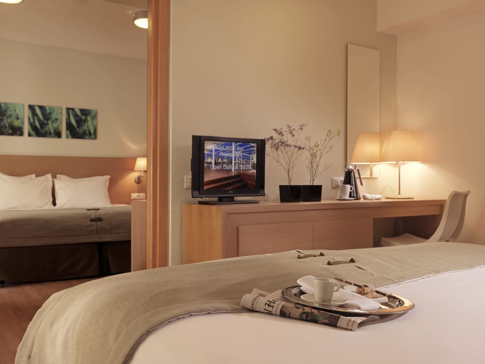 Family Room | Premium bedding, in-room safe, desk, soundproofing