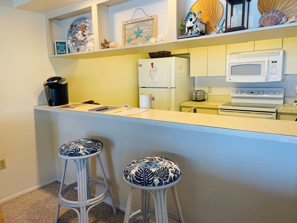 Condo, 2 Bedrooms | Private kitchen | Coffee/tea maker, fridge, microwave, oven