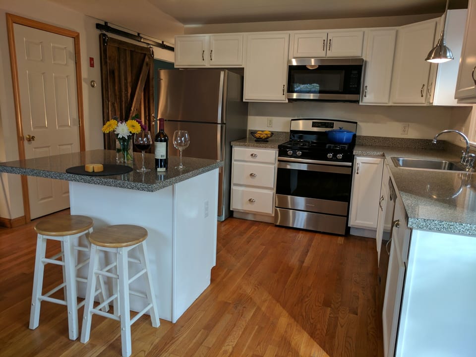 The kitchen is bathed in natural light