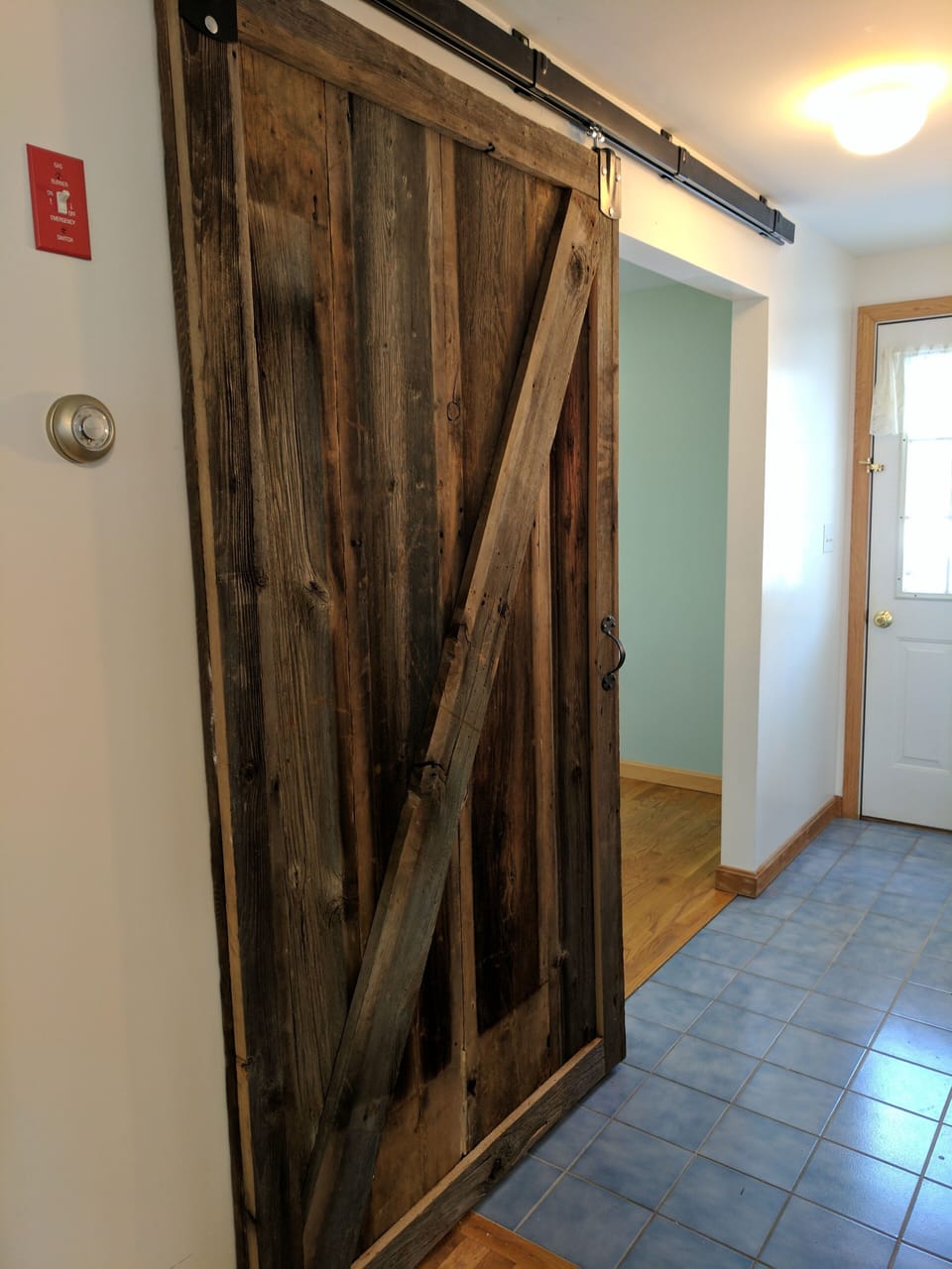 Repurposed barn door salvaged from upstate New York