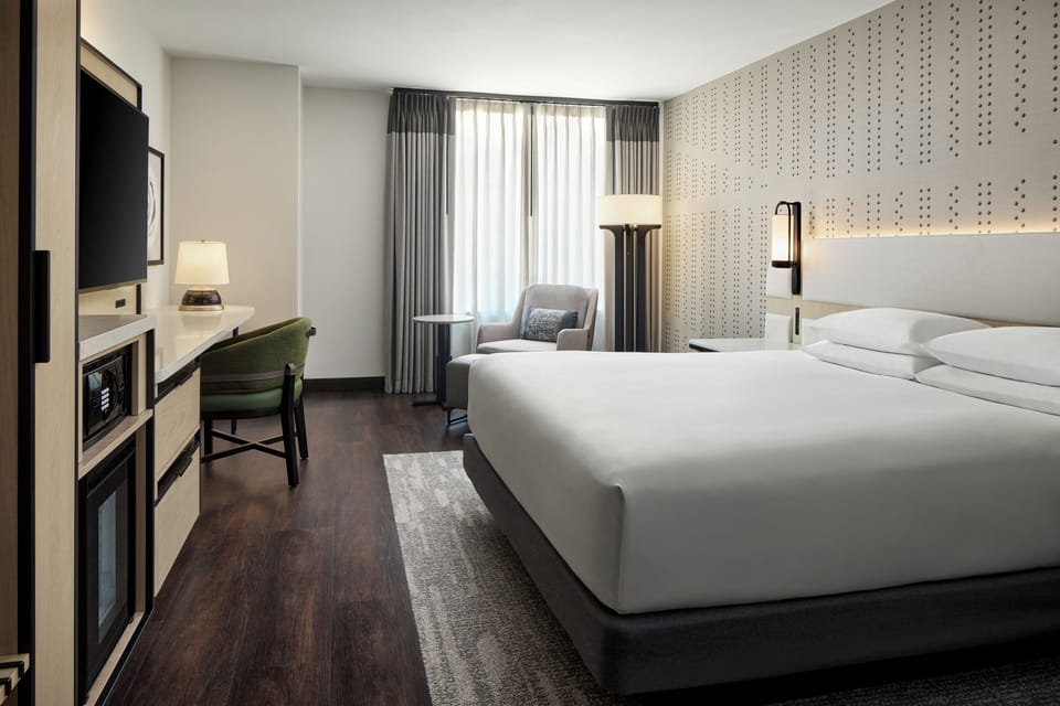 Premium bedding, down comforters, pillowtop beds, in-room safe