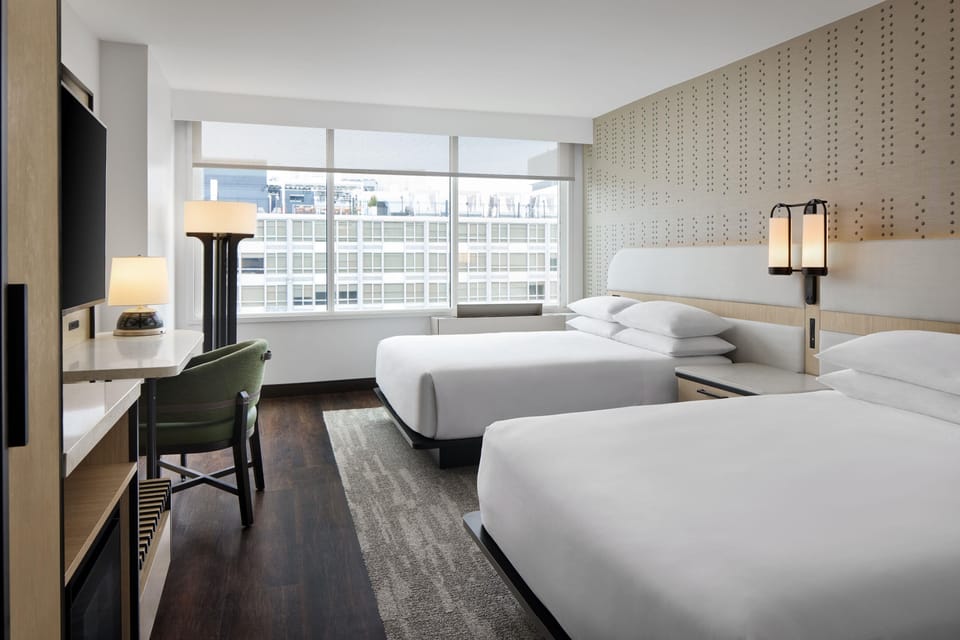 Premium bedding, down comforters, pillowtop beds, in-room safe