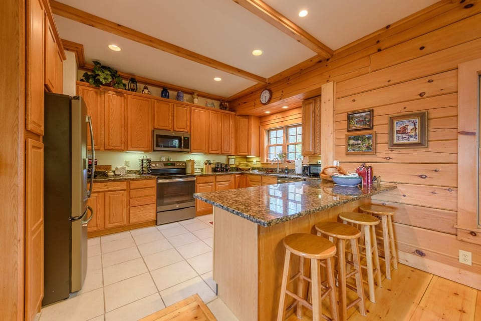 Kitchen with Updated Stainless Steel Appliances, seating at bar