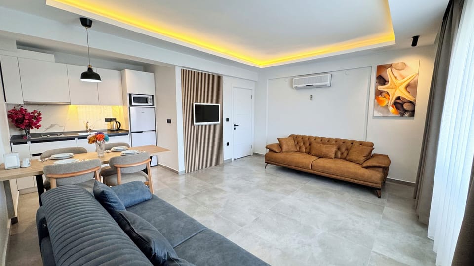 Apartment, 2 Bedrooms | Living area | LED TV
