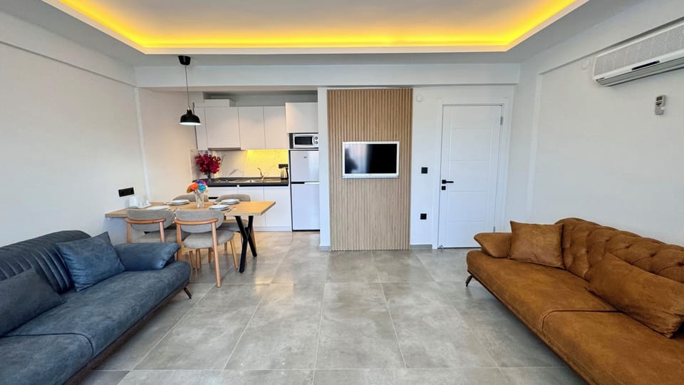 Apartment, 2 Bedrooms | Living area | LED TV
