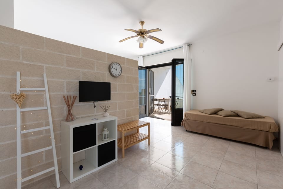 Suite, Balcony | WiFi (free), bed sheets