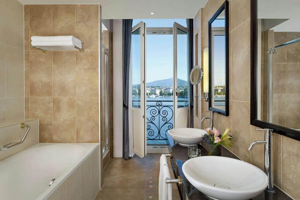 Suite, 1 Bedroom, Balcony | Bathroom | Designer toiletries, hair dryer, bathrobes, slippers