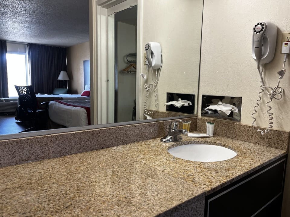 Standard Room, 2 Queen Beds | Bathroom | Combined shower/tub, free toiletries, towels