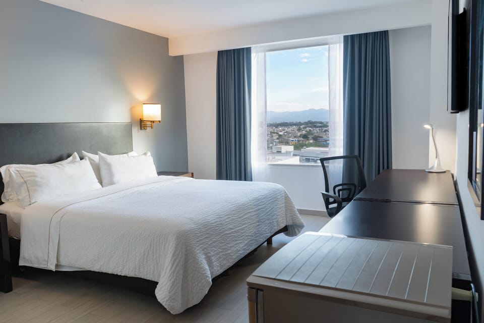 Junior Suite | Down comforters, pillowtop beds, in-room safe, desk