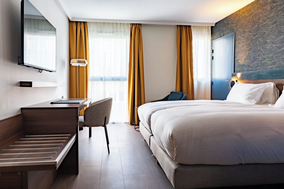 Standard Room, 2 Twin Beds | In-room safe, desk, soundproofing, iron/ironing board