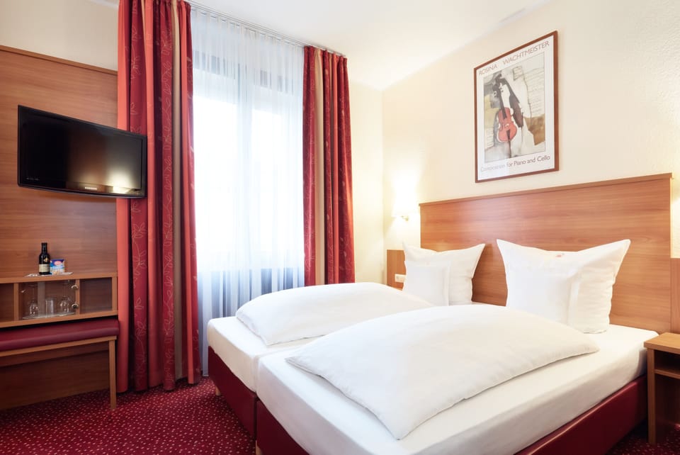 Double or Twin Room | Hypo-allergenic bedding, minibar, in-room safe, desk