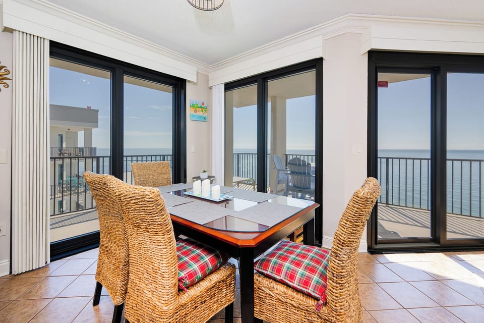 Savor peaceful moments around the dining table while taking in the lovely coastal views from your balcony