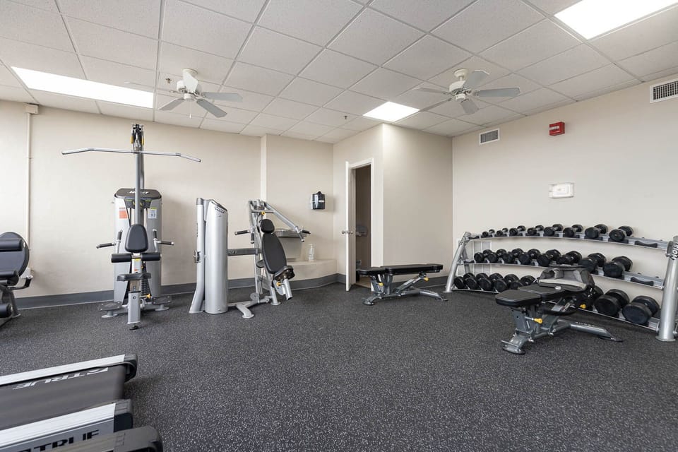 Get in your workout routine on vacation in our well-equipped fitness center featuring various machines and free weights