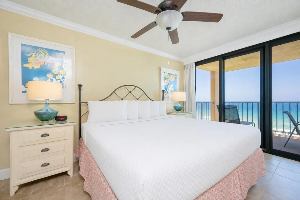 Relax in the king master suite, savoring the coastal views from your beachfront balcony