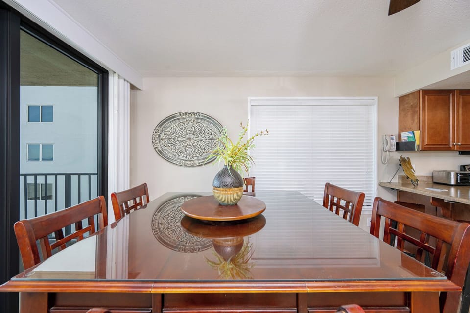 Gather around the table to enjoy great conversations, with coastal charm enhancing your vacation vibe