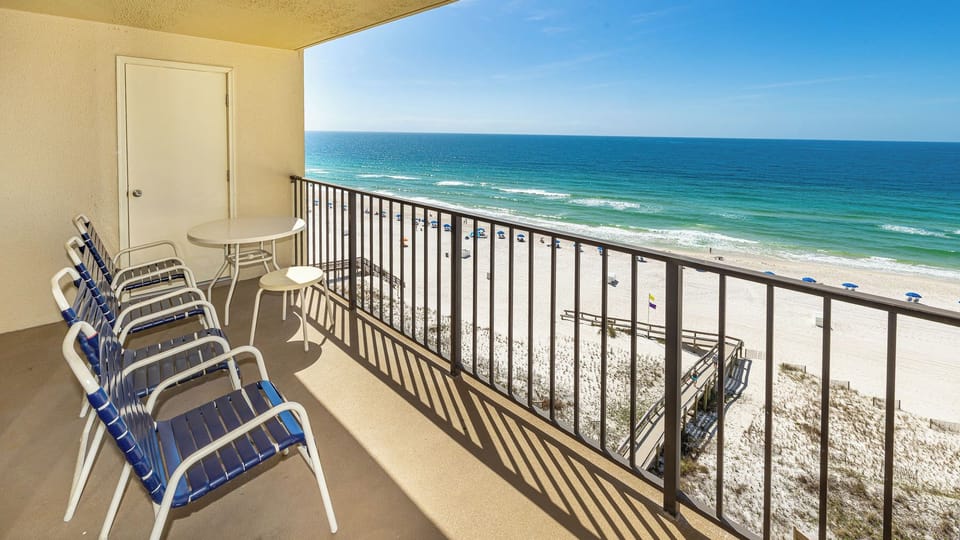 Relax on your balcony, taking in coastal views and the gentle sounds of waves crashing at the shore