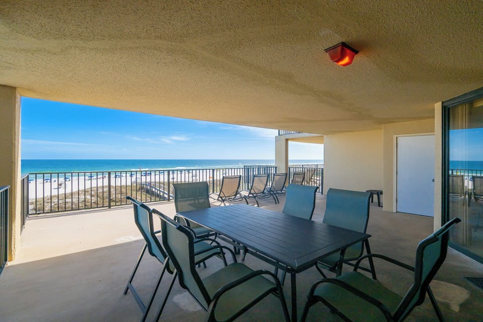 Your balcony offers plenty of seating to gather, share stories, and watch the shore stretch out before you