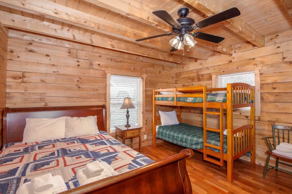 Twin Hollows upstairs bedroom with queen bed and twin/twin bunk bed