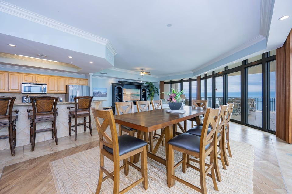 Gather around the spacious dining table for family game nights while enjoying beautiful coastal views