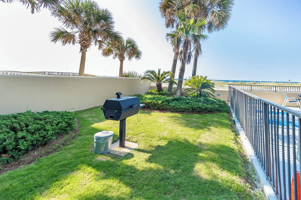 Grill up a meal surrounded by palm trees, with a beautiful beachfront view just steps away from your relaxing getaway