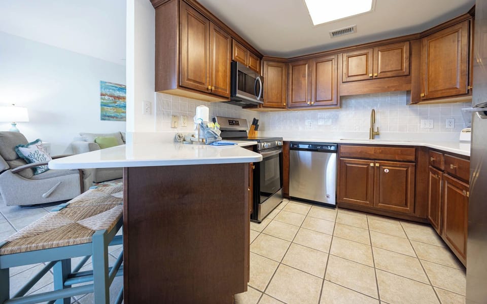 Cook and gather at the stylish kitchen with ample counter space and modern appliances for your culinary adventures