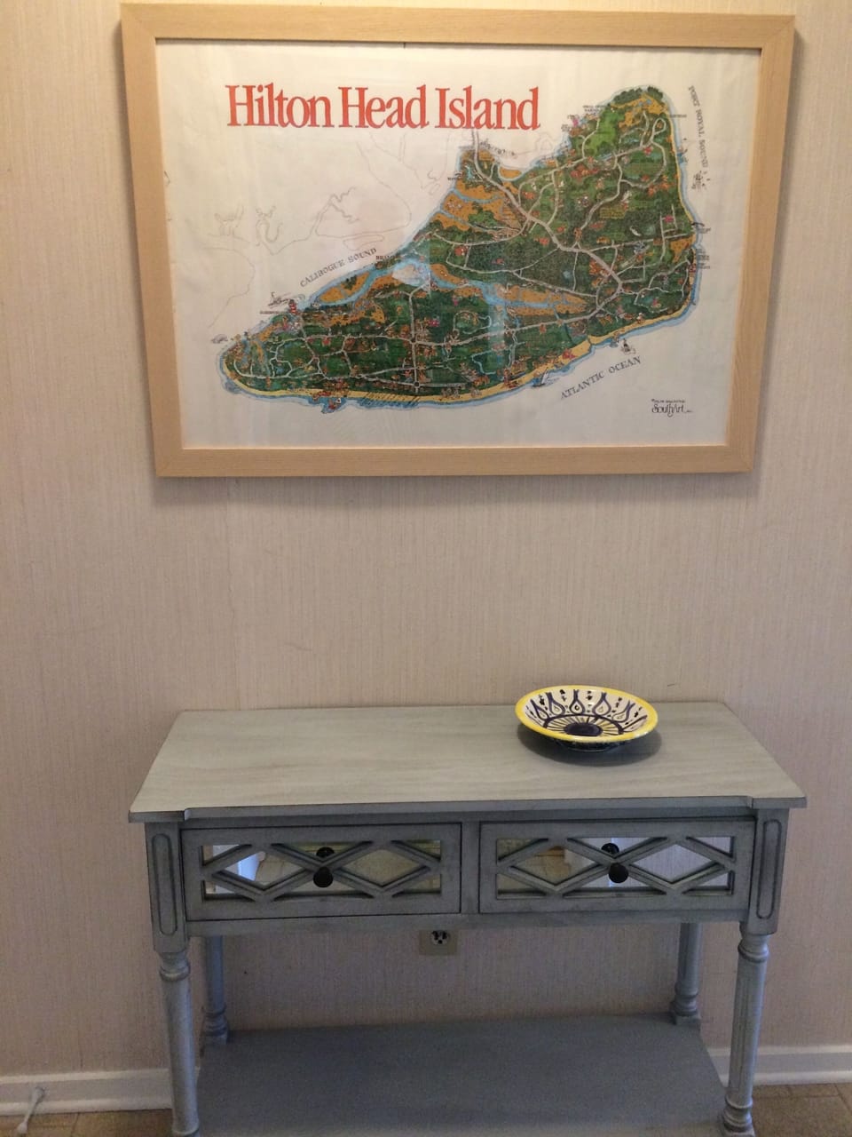 Entry credenza with vintage Hilton Head Island poster.