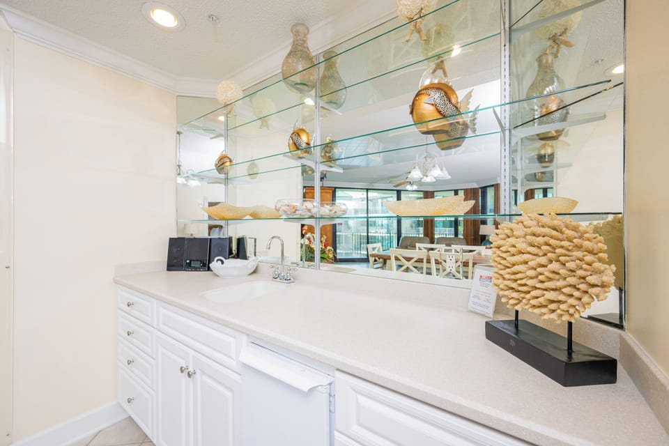 Grab a chilled drink from the fridge or create your favorite cocktail at the wet bar