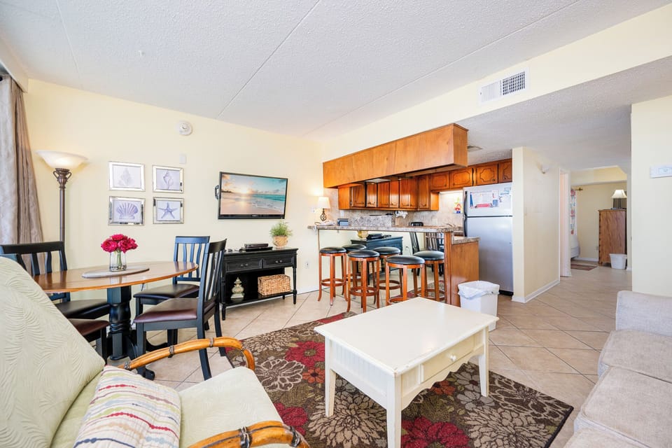 Kick back on the comfy seating, enjoying your favorite show while the coastal vibe fills the air around you