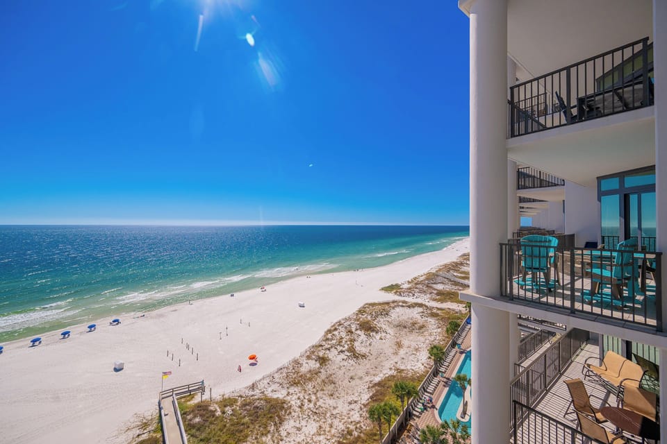 Experience seemingly endless coastline views of the horizon as waves lap the shore and the sun glistens over the water