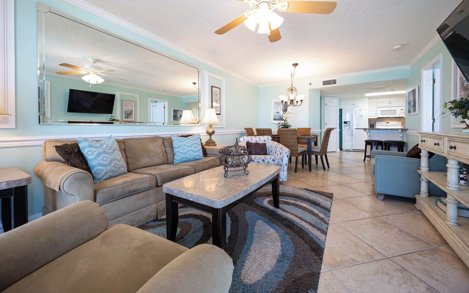 Unwind in this spacious living area, featuring a queen sleeper sofa and cozy seating