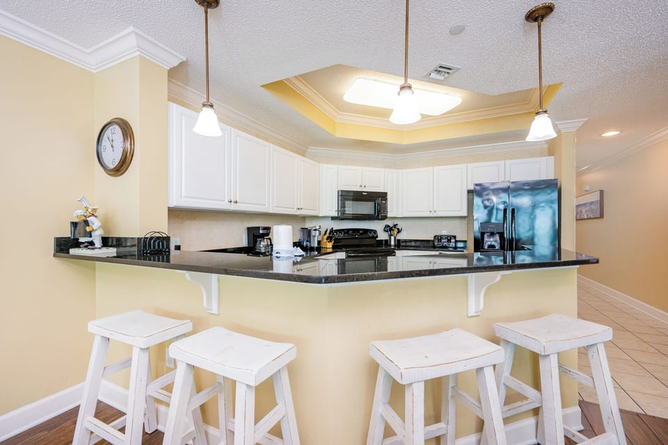 Gather your family around the breakfast bar, enjoying casual conversations and morning coffee in a friendly vibe