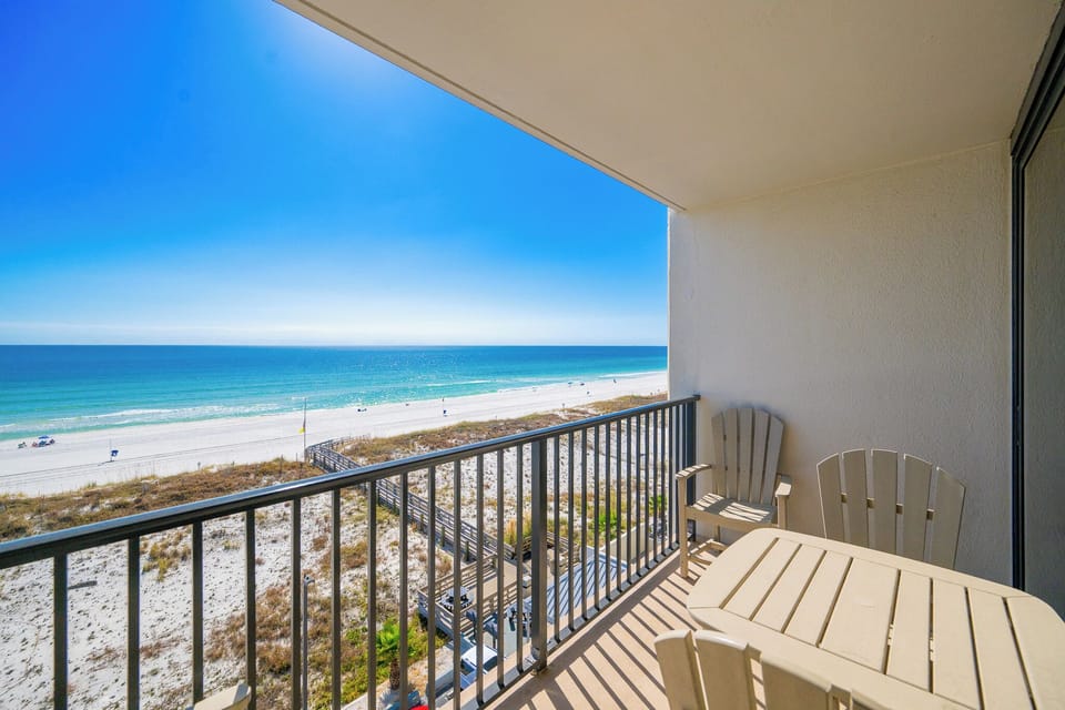 Relax on your balcony, soaking in the tranquil coastal views and gentle sounds of the surf