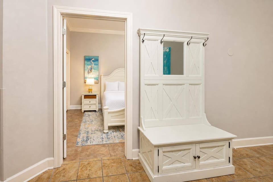 Step into a welcoming entryway, where your beach getaway begins with stylish decor and an inviting vibe