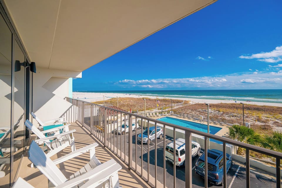 Relax on your balcony, soaking in the vibrant coastal views and warm sunshine while enjoying the soothing sounds of the waves