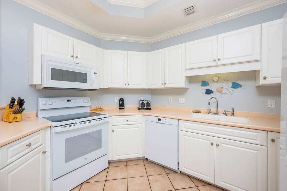 Create delightful dishes while enjoying the friendly atmosphere in this spacious kitchen