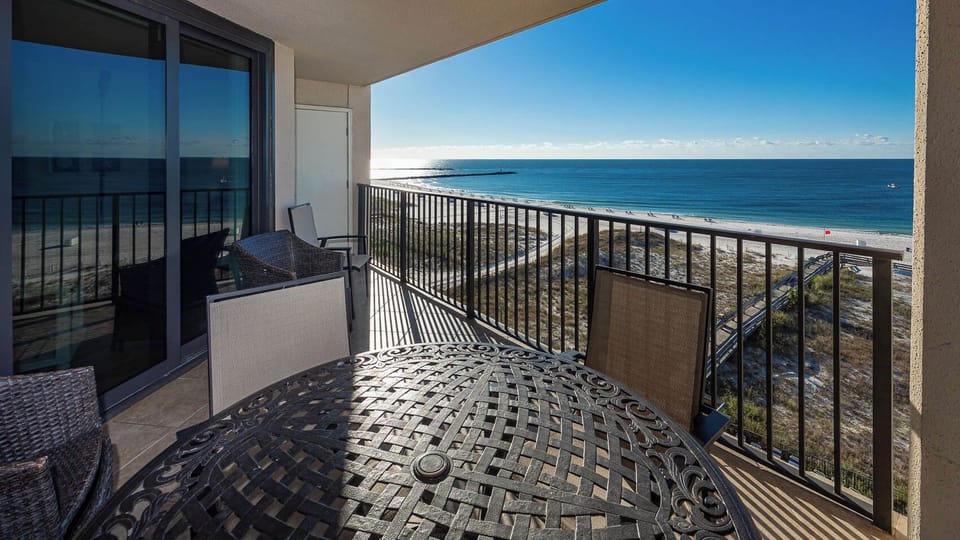 Enjoy meals or drinks while taking in the expansive water views from your balcony