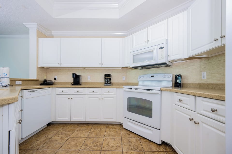 Create delicious meals with ease in this bright kitchen, designed for family fun and memorable moments together