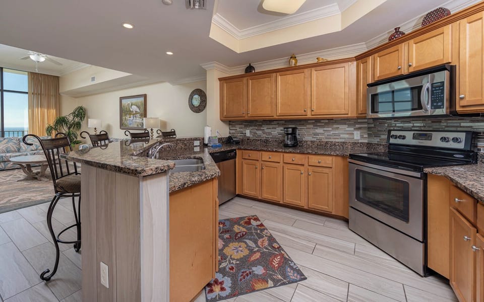 Delight in the spacious kitchen, perfect for casual chats while preparing snacks or mixing drinks