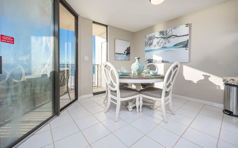 Dine at the charming table set for four, with lovely decor and views that invite relaxation and conversation