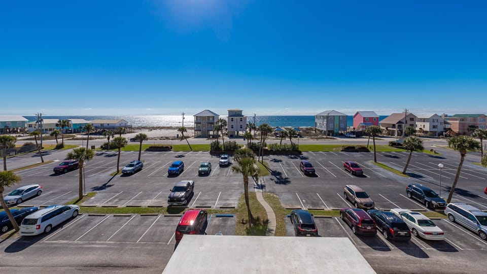 Take in the beautiful beach view and relax in this welcoming space just steps from the sandy shore