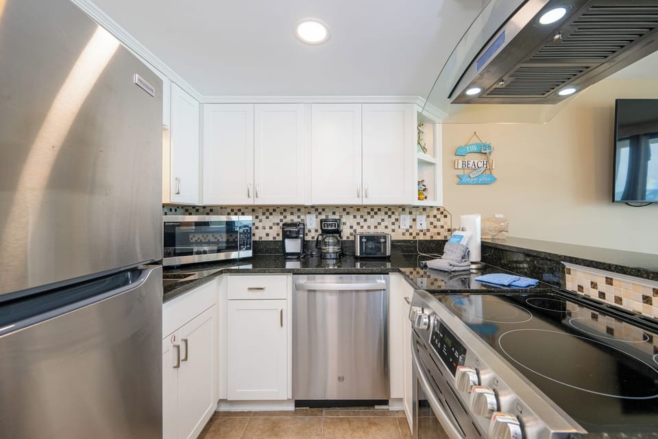 Create delicious meals together while enjoying the welcoming vibe of the kitchen and its smooth countertops