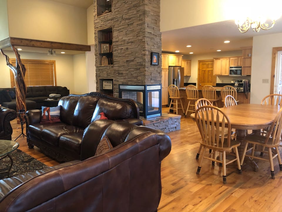 Spacious Open Floor Plan with Kitchen and Two Living Areas and Fireplace